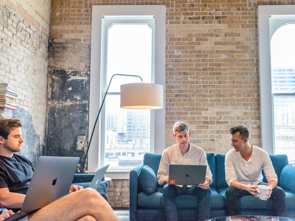 Casual meeting in a modern workspace setting.